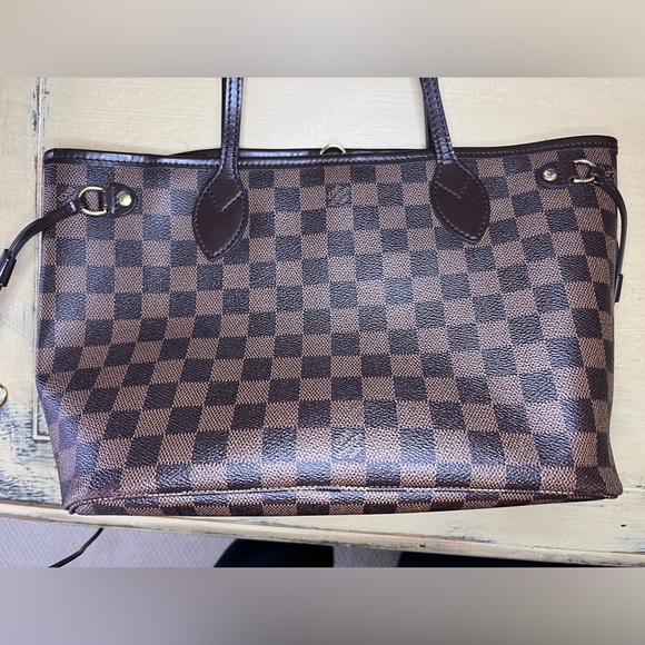 - Louis Vuitton Never-full - Picture 4 of 16